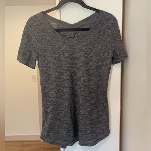 Lululemon Loose Fitting Short Sleeve Crew Neck Workout Top With Clinched V Back
